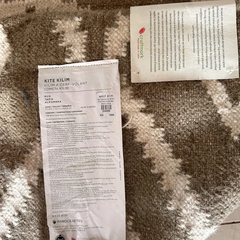 West Elm never used 5x8 tan rug Orig $499 w/ free unused $50 non slip rug pad